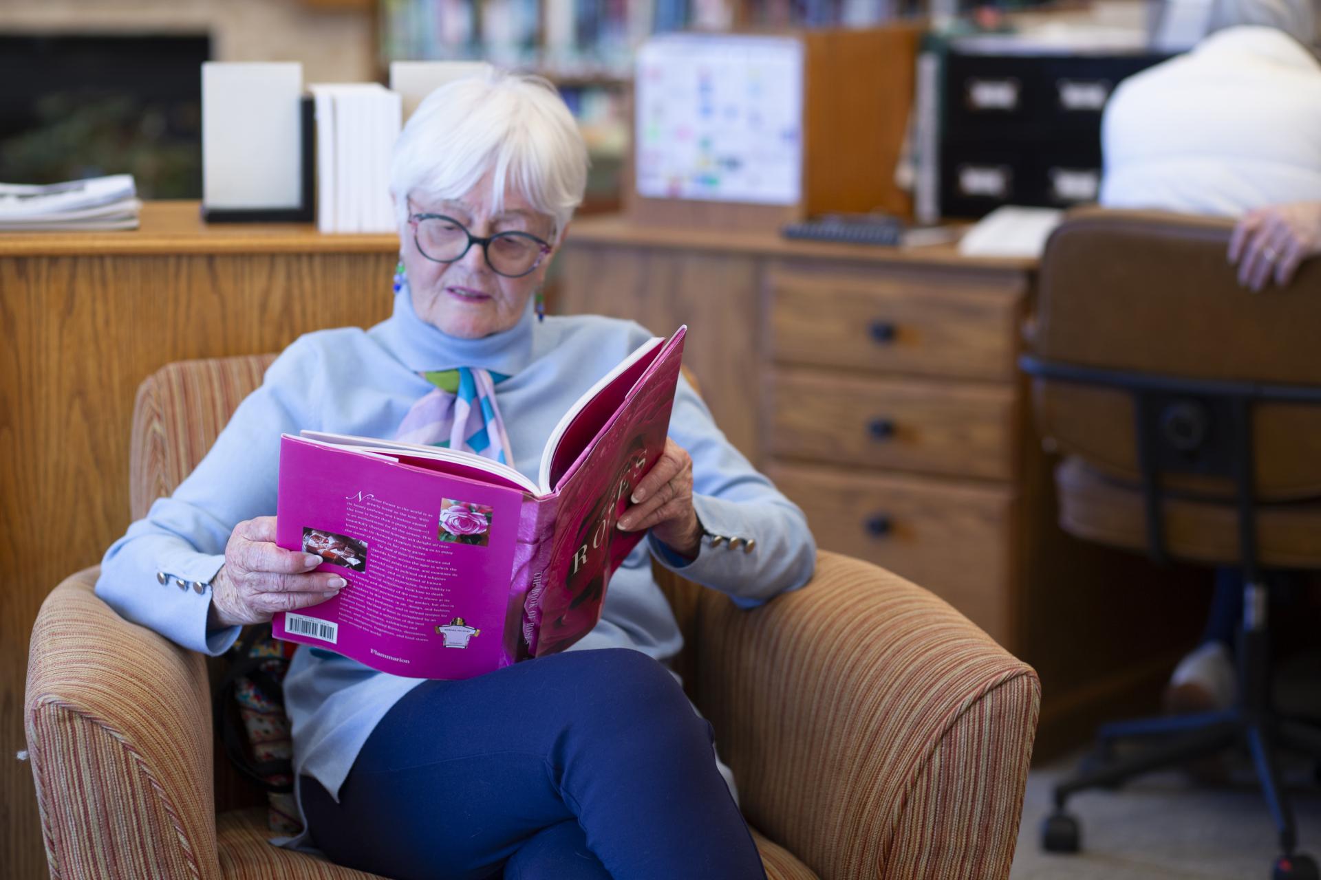 Seniors socializing in living room