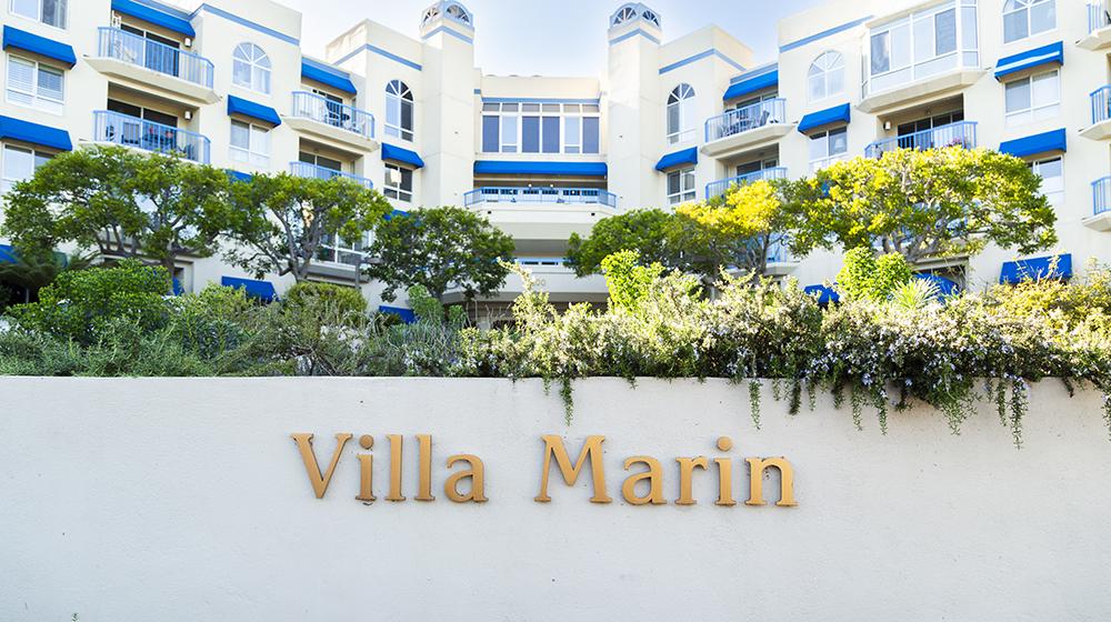 Exterior front of buildings with sign