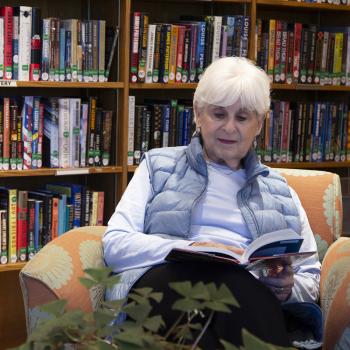 Woman reading in library